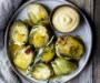 Wine Braised Artichokes with Cashew Mandarin Tarragon Aioli